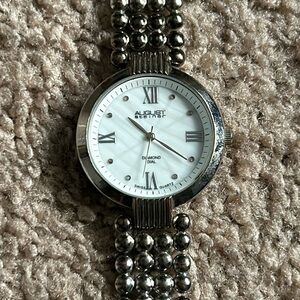 August Steiner vintage diamond dial swiss quartz watch OS measurements shown